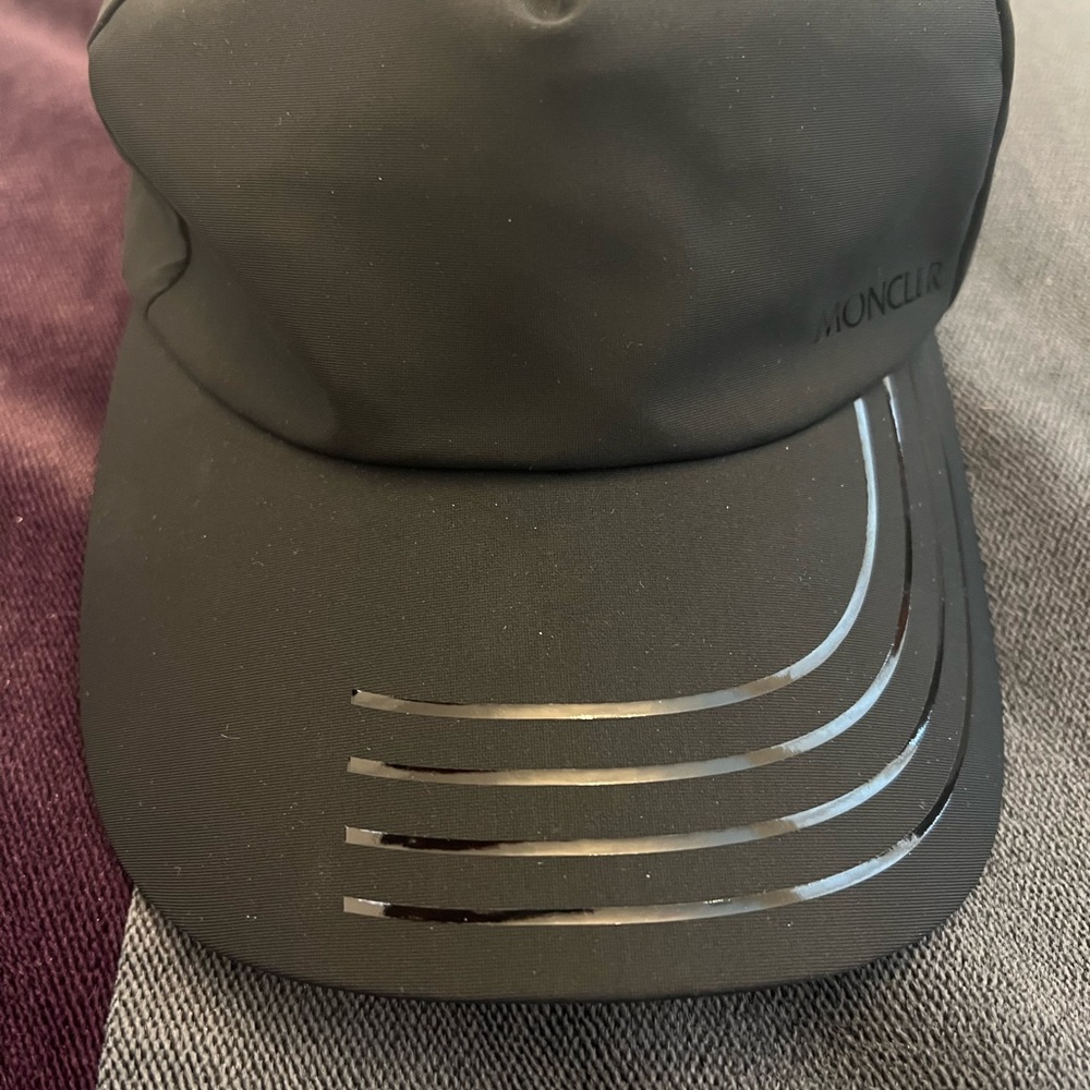 Moncler cap . New without tags . Runs small. Open To Offers!